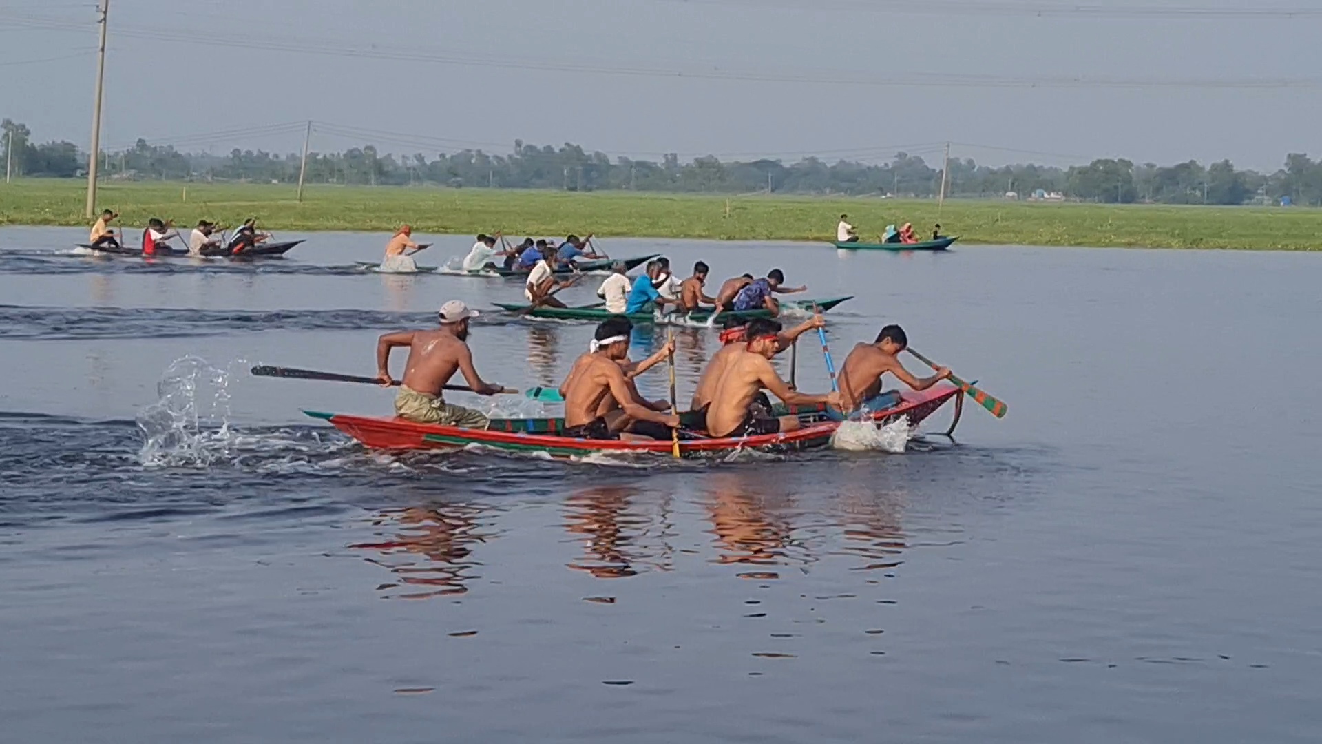 বাসাইলে নন্দন বিলে নৌকা বাইচ প্রতিযোগিতা অনুষ্ঠিত